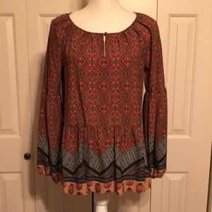 Women’s long sleeve peplum top.